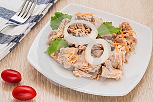 Canned tuna fish on white dish