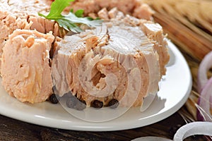 Canned tuna fish in white plate