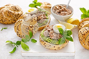 Canned tuna open sandwiches. Buns burgers with canned tuna, boiled egg and avocado