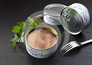 Canned tuna parsley and fork