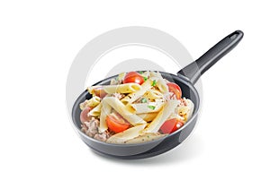 Canned Tuna tomato garlic parsley pasta in a pan on a white isolated background