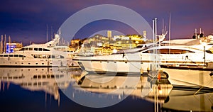 Cannes. Old town of Cannes on French riviera yachting harbor evening view