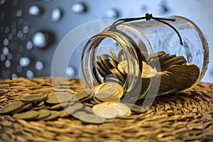 canning jar with coins, concept of saving, keep savings