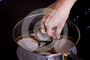 Canning lids in water