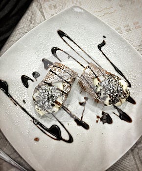 Cannolo siciliano traditional homemade sweet Made with ricotta cheese and chocolate
