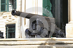 Cannon before Auberge de Castille photo