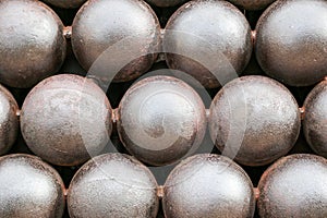 Cannon Balls arranged in a pile background
