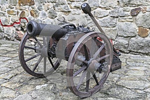 Cannon in castle Tropsztyn in Poland