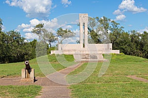 Cannon in front of a monument