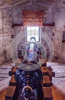 Cannon pointing through a window of Pendennis castle