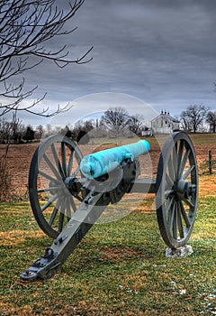 Cannon Points Toward Farmhouse