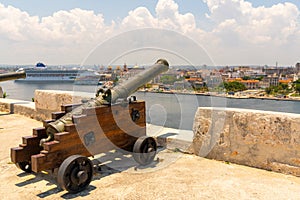 Cannons at Fort of Saint Charles and cruise ship in Havana