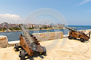 Cannons at Fort of Saint Charles and cruise ship in Havana