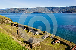 Cannons lined up pointing to the sea in Fort Niebla photo