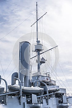 Cannons and mast on the battle cruiser Aurora on the Neva river in Saint Petersburg