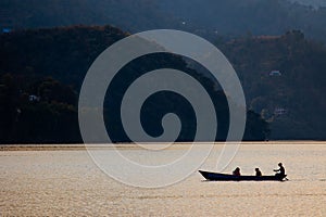 Silhouetted Sunset Canoe Boat Ride