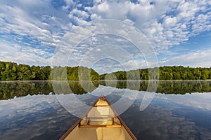 Canoe bow on a Canadian lake in summer photo