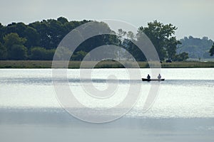 Canoe with fishermen