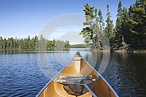 Canoe with fishing net on northern Minnesota lake