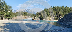 Canoe in front of Bow Falls, Banff