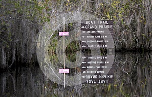 Canoe and kayak boat trail directional sign in the Okefenokee Swamp, Georgia USA