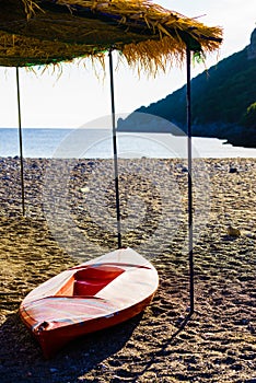 Canoe kayak on sand beach