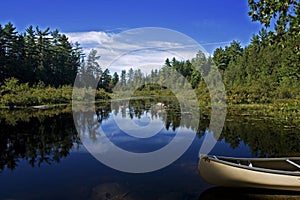 Canoe in a lake wide