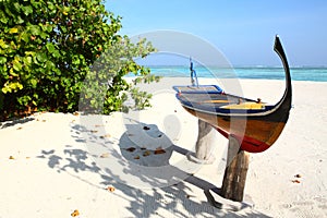 Canoe on Maldives beach