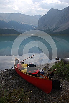 Canoe by placid lake