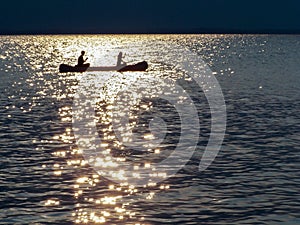 Canoe Silhouette - Sparkling Golden Ribbon Setting Sun