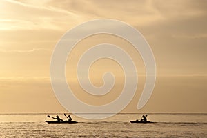 Canoe Surfing Sunset