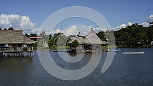 Canoe with tourists crosses the lagoon El Milagro.Tingo Maria, Peru