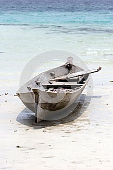 Canoe on tropical beach