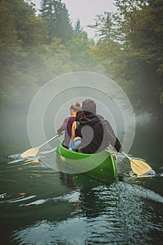 Canoeing in a cold and foggy environment