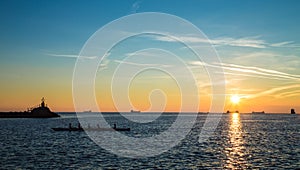 Canoeing in the evening in bay of Trieste