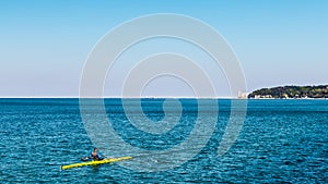 Canoeing in the evening in bay of Trieste