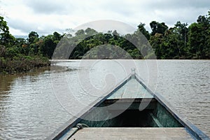 Canoeing on the remote Itaquai river far from any civilization