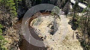 Canoeing, a type of rowing sport, follow of dual kayak going down the river.