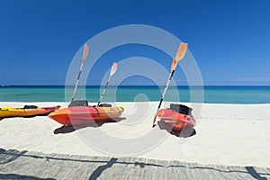 Canoes on beach by the Mediterranean Sea
