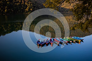 Canoes and Calm, Reflective Waters