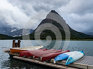 Canoes On Dock Below Grinnell Point photo