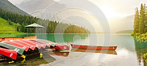 Canoes at Emerald lake near Golden in Yoho National park in the canadian Rocky Mountains, British Columbia Canada