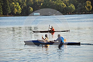 Canoes on a lake