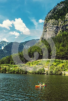 Canoes on lake Hallstatt, Hallstatt, Salzkammergut, Upper Austria, Austria