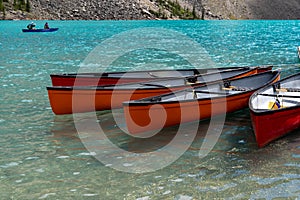 Canoes at Moraine Lake in Banff National Park, at the shoreline