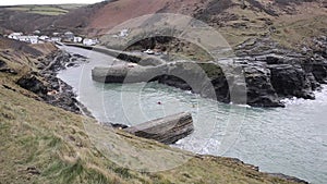 Canoes paddling between harbour walls Boscastle North Cornwall England UK England UK