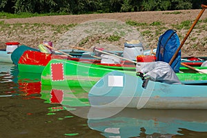 Canoes on the Riverside