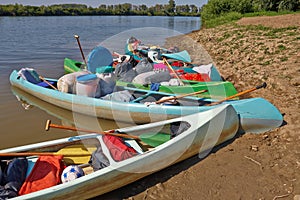 Canoes on the Riverside