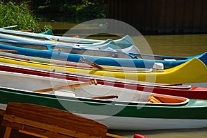 Canoes on the Riverside