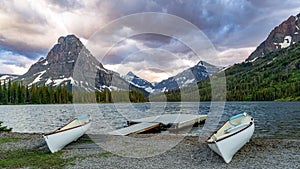 Canoes on the shore of Two Medicine Lake Glacier National Park